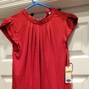 Red shirt with black dots